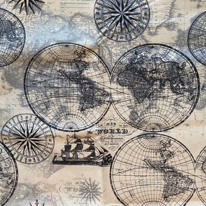 May include: A beige fabric with a repeating pattern of black and white world maps and compass roses. The text "A New Map of the World" is printed on the fabric.