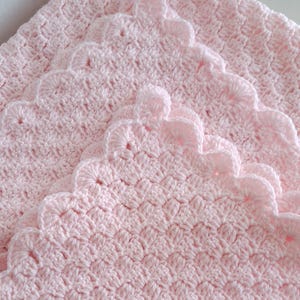 Handmade Crochet Baby Blanket: Soft Pink Knit Nursery Decor
