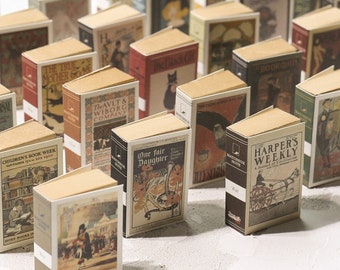 May include: A collection of miniature book-shaped boxes with various vintage book covers. The boxes are made of cardboard and have a rustic, antique aesthetic. The covers feature illustrations and text from classic books, such as "The True Mother Going", "The Avlt & Wiborg Company", "One Fair Daughter", and "Harper's Weekly".