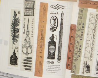 May include: A collection of vintage-style washi tape featuring various designs, including a feather, scissors, an ink bottle, a quill pen, a ruler, and text. The text includes "Please Notice This", "Live Better", "Wink", "black", "cool", "cre-ate", and "S.J. Kelley Engraving Co."