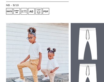 May include: Two children wearing brown and white sweatpants with a drawstring waist. The sweatpants are available in sizes NB - 9/10. The image also includes a line drawing of the sweatpants.