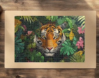May include: A close-up of a tiger's face peering out from behind lush green foliage. The tiger has orange and black stripes and piercing green eyes. The background is a vibrant green with hints of pink flowers.