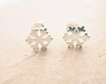 Sterlingzilveren sneeuwvlokoorknopjes: kerstsieraden voor de feestdagen