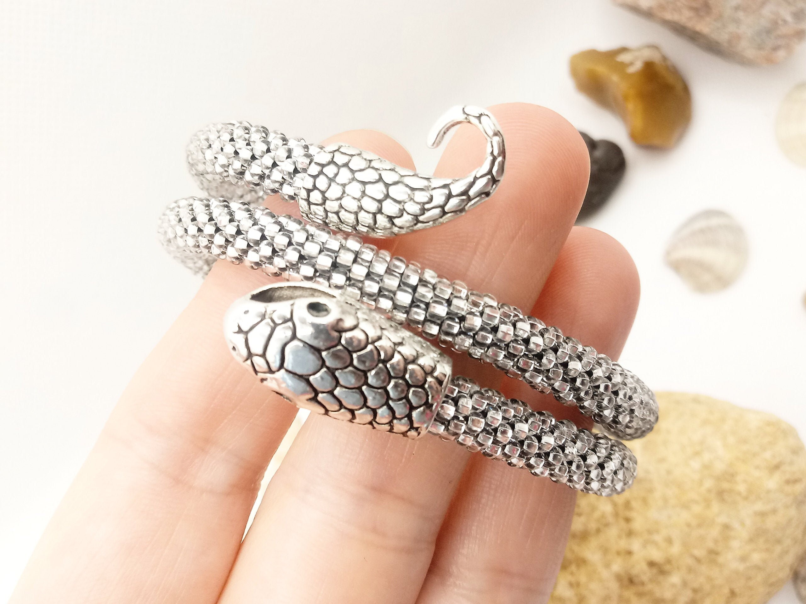Snake Wraps Coils Around Women