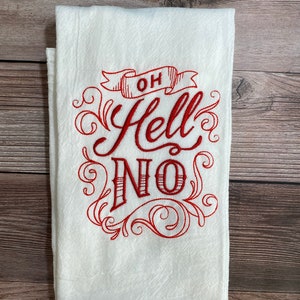 May include: White kitchen towel with red embroidered text that reads "Oh Hell No" with decorative flourishes.