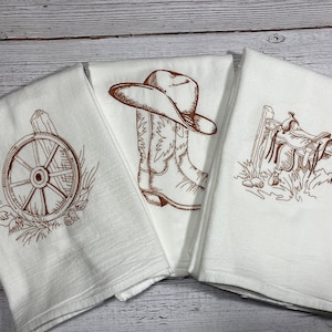 Western Trio Flour sack kitchen towel, Sold individually or in sets, Cowboy, Cowgirl, Rodeo, Country, Hat, Saddle, Wagon Wheel, Farm, Rustic