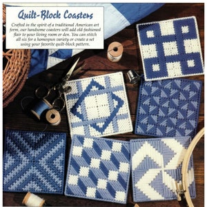 May include: Six blue and white quilted coasters with different patterns. The coasters are made in the style of traditional American quilt blocks.