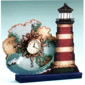 Patrón de lona plástica del reloj del faro