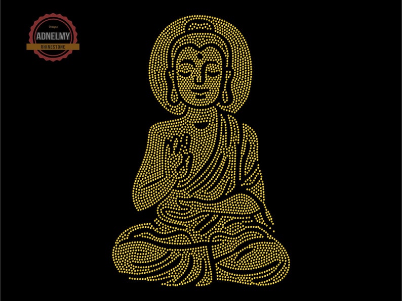 May include: A gold rhinestone design of a meditating Buddha. The Buddha is sitting in a lotus position with hands in a mudra gesture.