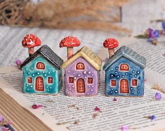 Small Multi-Colored Ceramic House with a Mushroom