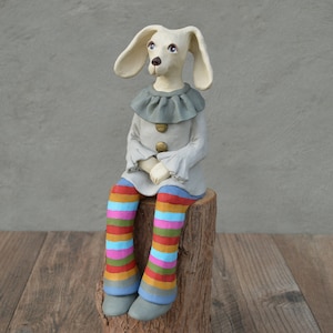 Sitting dog. Handmade ceramic sculpture, to be placed on the shelf ( without wooden stand )