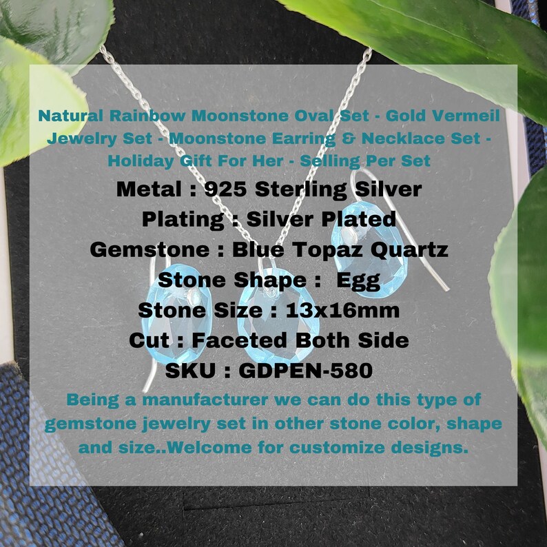 May include: A silver necklace and earrings set with a blue topaz quartz gemstone. The gemstone is egg-shaped and measures 13mm by 16mm. The set is made of 925 sterling silver with a silver plated finish. The SKU is GDPEN-580.