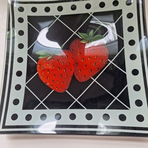 Acrylic Strawberries 9" x 9" square plate with black border.