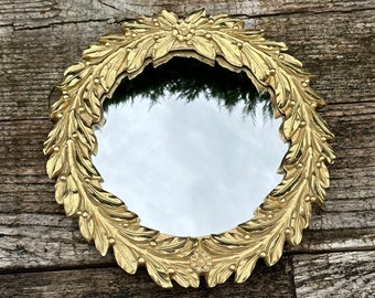 Golden Courtney mirror with witch's eye Diam 18 cm