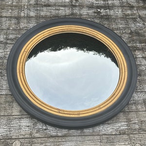 Round mirror called "witch's eye" in Napoleon III style, matt black and gold Diam. 64 cm