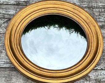 Miroir style Napoléon III avec "oeil de sorcière" doré patiné  Diam 51 cm