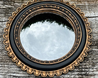 Miroir Eugénie noir et patine dorée cuivré avec oeil de sorcière diam 18 cm