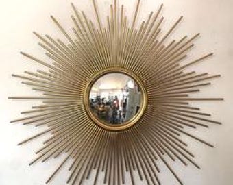 Sun mirror with golden sheet metal needles and witch's eye Diam 93 cm