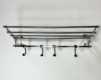 "Train" coat rack in shiny chrome-plated aluminum