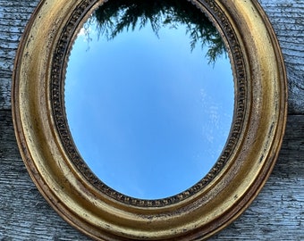 Rosalie oval mirror in patinated gold 34 x 29 cm