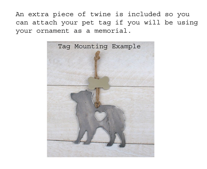 May include: A metal dog silhouette ornament with a heart cut out and a bone-shaped tag hanging from it. The ornament is attached to a piece of twine. The text "Tag Mounting Example" is written above the ornament.