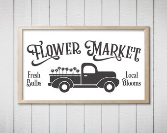 May include: Black and white illustration of a vintage pickup truck with flowers in the bed. The text "FLOWER MARKET" is above the truck. The text "Fresh Bulbs" is to the left of the truck and "Local Blooms" is to the right.