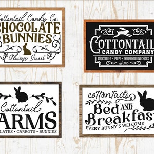 May include: Four wooden signs with a rustic farmhouse theme. The signs feature a black silhouette of a rabbit and the text "Cottontail Candy Co. Chocolate Bunnies 5&cent; Always Sweet 5&cent;", "Cottontail Candy Company Chocolates, Peeps, Marshmallow Chicks est. 1863", "Cottontail Farms Chocolates, Carrots, Bunnies", and "cottontails Bed and Breakfast Every Bunny's Welcome".