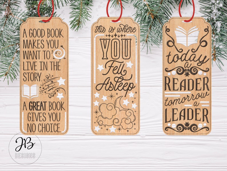 May include: Three wooden bookmarks with inspirational quotes about reading. The first bookmark says "A good book makes you want to live in the story. A great book gives you no choice." The second bookmark says "This is where you fell asleep." The third bookmark says "Today a reader, tomorrow a leader."