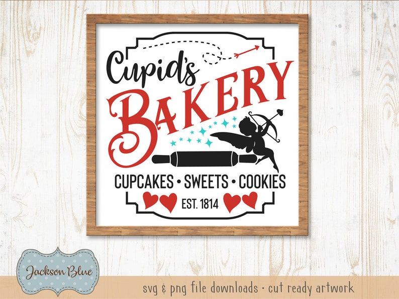May include: A white sign with a brown wooden frame, featuring the text "Cupid's Bakery" in red and black lettering. The sign also includes a silhouette of Cupid with an arrow, a rolling pin, and the text "Cupcakes Sweets Cookies Est. 1814".