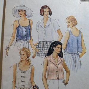 McCall's 7612 set of tops with collar and sleeve variations, pick your size, all uncut and factory folded, please see description