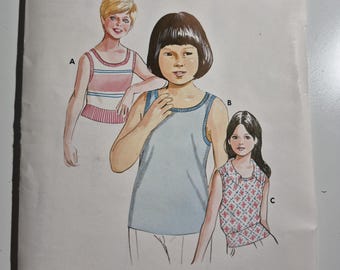 Kwik Sew 547 girls sleeveless pullover top/vest variations,  sizes 8,10,12, uncut and factory folded, see description and photos, Vintage