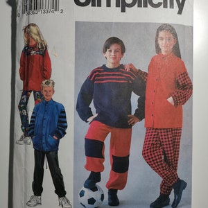 May include: Simplicity sewing pattern number 8146 for sizes AA (7-10). The pattern includes instructions for making a red and black striped sweater, red pants with black stripes, a red jacket with black and white checkered sleeves, and red and black checkered pants.