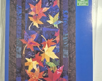 Drifters Quilt pattern finished size 27"x52" by Bee Creative Studio, "rich pageant of color on display every autumn " C.2002 see description