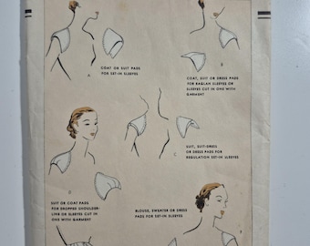 Vogue 7503 rare shoulder and hip pad sewing patter, one size, uncut and factory folded, see description and photos C.1953