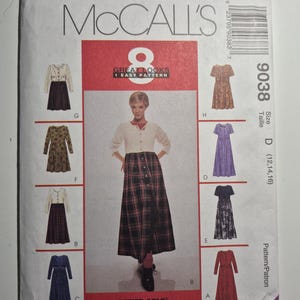 May include: McCall's sewing pattern envelope featuring illustrations of eight different dress and skirt designs. The envelope has the text "8 Great Looks 1 Easy Pattern" and "Petite-Able". The pattern number is 9038, size D (12, 14, 16).