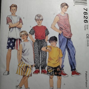 May include: A sewing pattern for boys' clothing, featuring four different outfits. The pattern includes a striped tank top, a red t-shirt with checkered pants, a yellow t-shirt with checkered shorts, and a yellow t-shirt with a graphic print on the shorts. The pattern is for sizes 3, 4, and 5. The pattern number is 7626.