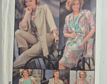 Simplicity 7312 top , skirt, pants and unlined jacket or dress, size 14, uncut and factory folded, see description and photos