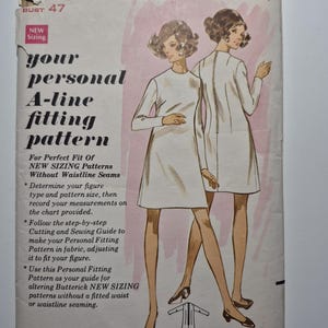 May include: A vintage Butterick 3001 sewing pattern envelope for an A-line dress. The front features illustrations of two figures wearing long-sleeved, high-neck dresses, with text including "your personal A-line fitting pattern" and size 24 1/2.