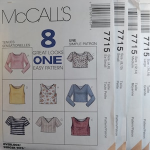 May include: McCall's sewing pattern number 7715 for eight different tops. The pattern includes sizes 4-6, 8-10, 12-14, and 16-18. The pattern is for a simple, easy pattern for great looks.