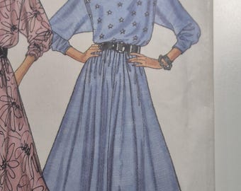 Butterick 5722 dress has drop shoulders,  sizes P,S,M, uncut and factory folded,  see description and photos C.1987