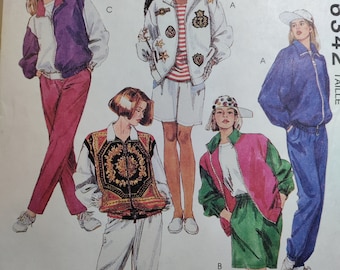 May include: A sewing pattern for four different jackets. The jackets are in various colors, including purple, white, blue, and green. The pattern is for size 12 and is from McCall's.