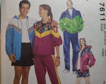 May include: A sewing pattern for a jacket and pants set. The pattern is for sizes small, petite. The pattern is from McCall's and the pattern number is 7611.