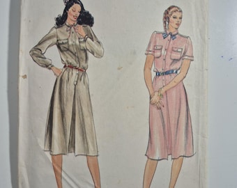 Butterick 3611 loose fitting, front buttoned dress, size 8 bust 31.5, uncut and factory folded, see description and photos, vintage