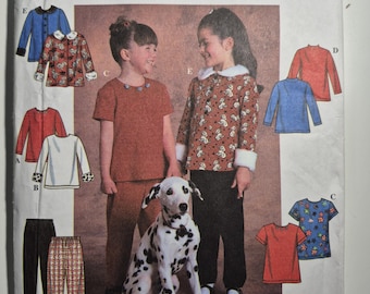 Simplicity 7824 childs top and pants, sizes 5,6,7,8, uncut and factory folded, see description and photos C.1997