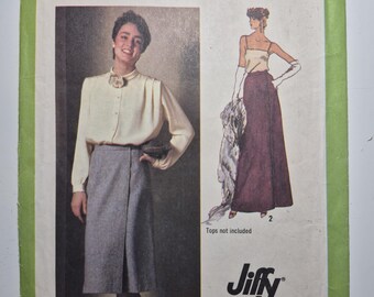 Simplicity 9113 Jiffy front wrap skirt in 2 lengths,  size 10 waist 25, uncut and factory folded, see description and photos C.1979