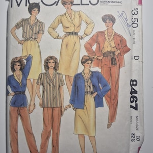May include: Vintage McCall's sewing pattern featuring illustrations of women's clothing designs. The designs include blazers, skirts, and pants in various colors. The pattern number is 8467, and the bust size is 32 1/2 inches.
