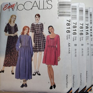 May include: Four different sewing patterns for dresses, sizes AX (4, 6, 8), B (8, 10, 12), B (8, 10, 12), and C (10, 12, 14). The patterns are for McCall's Easy 7816.