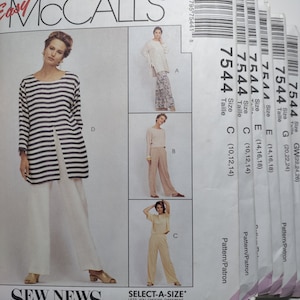 May include: A stack of McCall's sewing patterns for a women's top and pants. The pattern numbers are 7544 and the sizes are G (20, 22, 24), E (14, 16, 18), and C (10, 12, 14). The pattern is called "Select-A-Size" and allows you to choose different sizes for tops and bottoms.