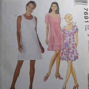 McCall's 7691 easy fitting dress with bust darts, pick your size, All uncut and factory folded, see description and photos