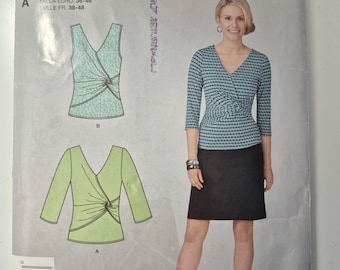 Simplicity 1849 knit tops, sizes 10,12,14,16,18,20, uncut and factory folded, see description and photos C.2012